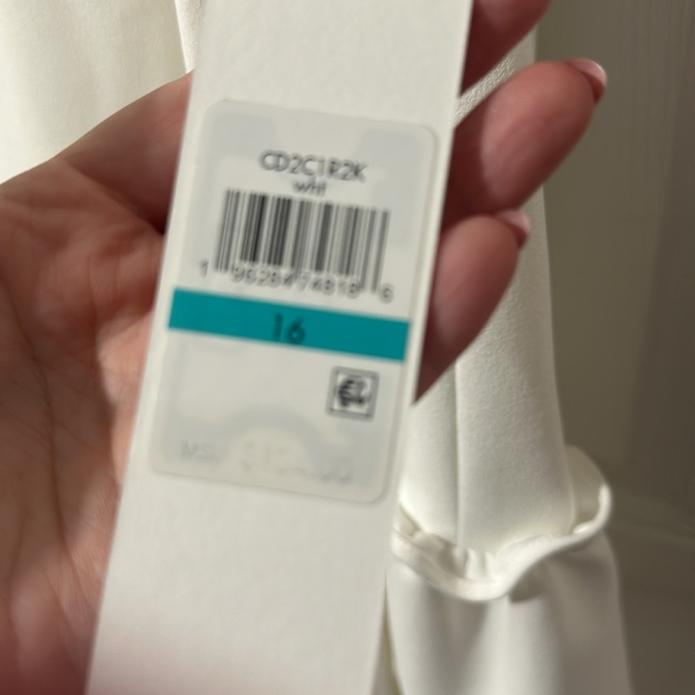 Calvin Klein white ruffle sleeve and bottom dress. Knee length. - Picture 3 of 3